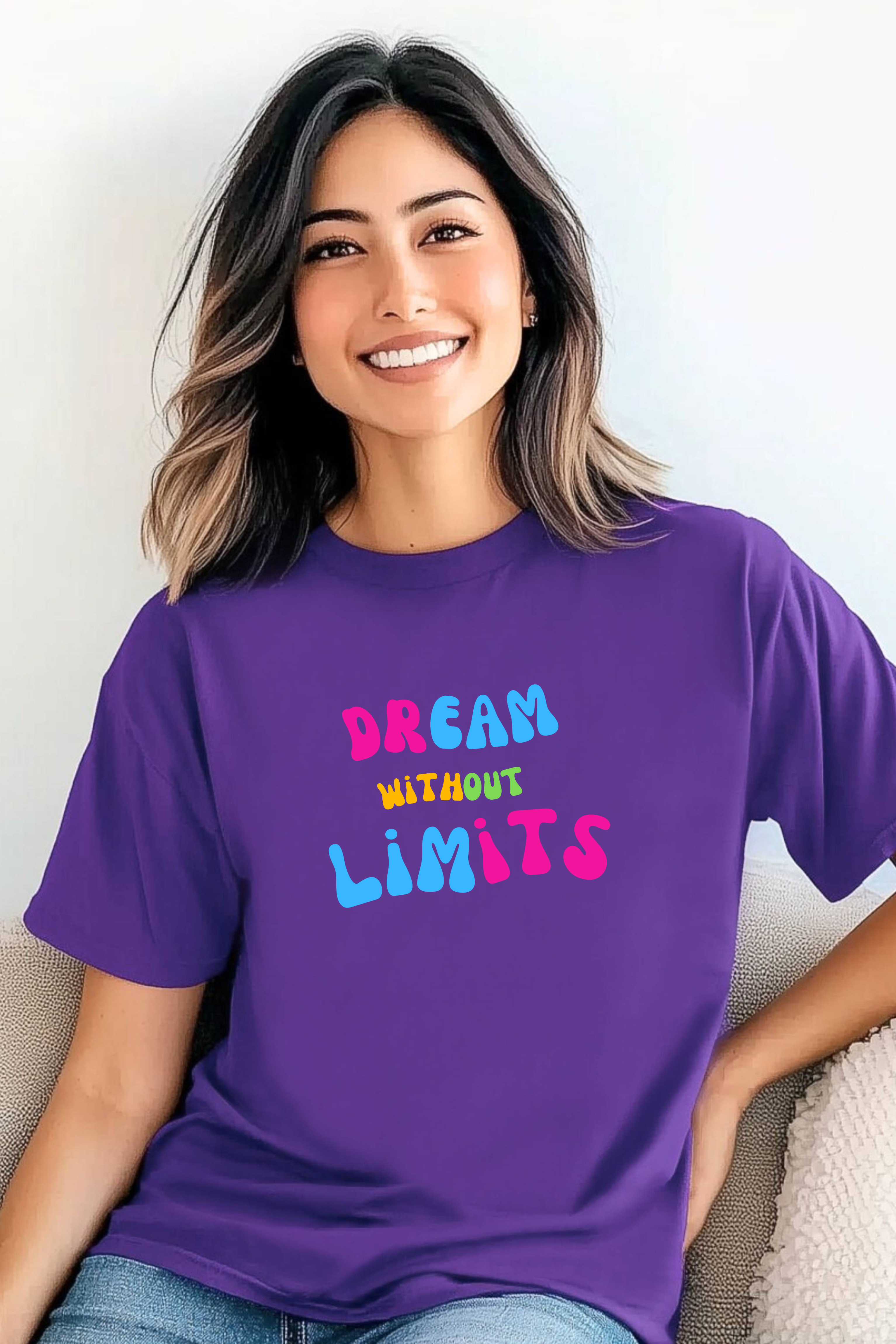 Woman wearing a purple t-shirt with 'Dream Without Limits' text
